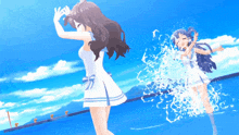 a girl in a white dress is splashing water at another girl