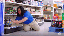 Superstore Stocking GIF - Superstore Stocking Shookt GIFs