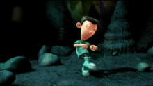 a cartoon character is standing in a cave surrounded by rocks .