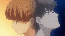 a man and a woman are looking at each other 's faces