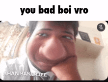 a man with a big nose is making a funny face and the caption says you bad boi vro .