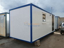 a white and blue container with a window and a sign that says " бытовки "