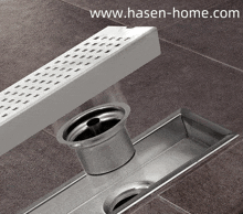 a picture of a drain with the website www.hasen-home.com at the top