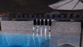a computer generated image of a swimming pool with water coming out of it
