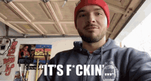a man is wearing a haunted mansion hoodie