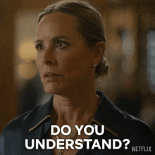 a woman in a blue shirt is asking do you understand