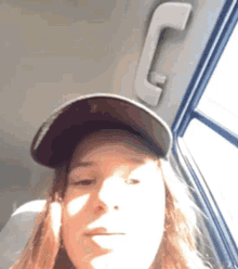 girl cap selfie too bright too much sunlight