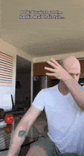 a man in a white shirt is covering his face with his hand with the caption " you just got the baddie braid hairstyle "