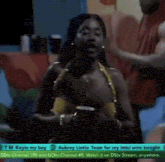 a woman in a bikini is holding a cup in front of a tm kayin my boy advertisement