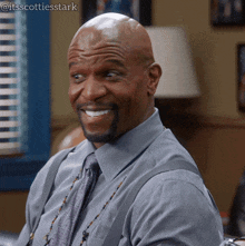 a man wearing suspenders and a tie smiles for the camera with the hashtag @itsscottiesstark