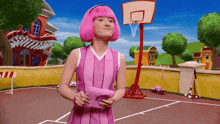a girl with pink hair stands on a basketball court