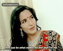 a woman in a saree is talking about what makes her feel that she is me .