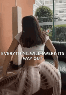 a woman is doing a twerk on a couch with a caption that says everything will twerk its way out