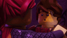 a close up of a lego character with a red hair