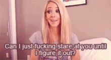 a blonde woman is sitting on a couch and says can i just fucking stare at you until i figure it out