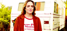 a woman wearing a t-shirt that says " arne 's for vacation "