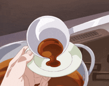 a person pouring something into a cup with a ladle