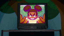 a tv with a cartoon character on it that says v0000