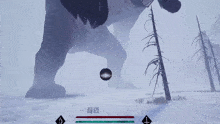 a screenshot of a video game shows a monster 's claws on a snowy field