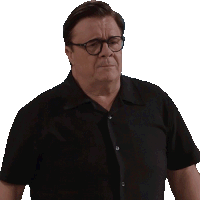 a man wearing glasses and a black shirt is looking at the camera