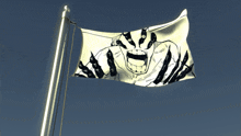 a flag with a picture of a man with a big smile on it