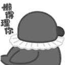 a penguin wearing a collar and sunglasses is talking to someone .