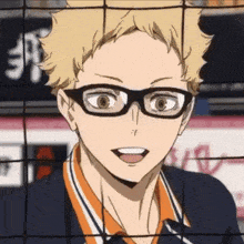a close up of a person wearing glasses behind a net .