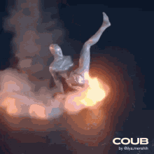 a statue of a man falling into a fire with coub written on the bottom