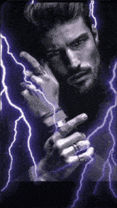 a black and white photo of a man with rings on his fingers and lightning behind him