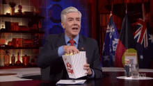 Mad As Hell Shaun Micallef GIF - Mad As Hell Shaun Micallef Popcorn GIFs