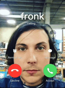 a man is talking on a cell phone with the name fronk calling