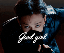 a man with a mask on his face and the words good girl below him