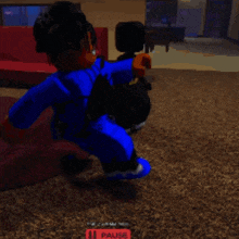 a person in a blue outfit is standing in a room with a red sign that says pause