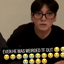 a man wearing glasses and a black shirt with the words " even he was weirded tf out "