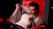 Hide From Embarrassment GIF - Adam Levine Embarrassed The Voice GIFs