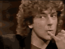 Led Zeppelin Tease GIF - Led Zeppelin Tease Lips GIFs