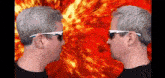 two men wearing sunglasses are standing next to each other and looking at each other .