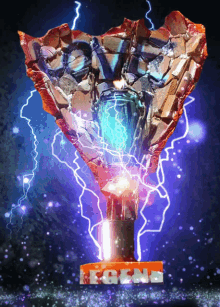 a statue with the word legend on it is surrounded by lightning bolts