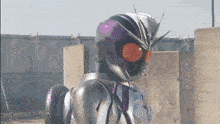 a close up of a person wearing a superhero costume