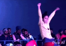 a man with his arms in the air is dancing in front of a crowd and the words pica ai are visible in the corner