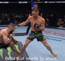 belal just needs to shoot while fighting another man in a boxing match