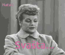 a black and white photo of natali svastica