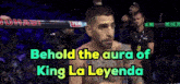 a man in a boxing ring with the words " behold the aura of king la leyenda "