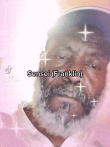 a man with a beard is wearing a hat and has the name sensei ( franklin ) written on his face