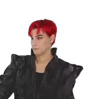a man with red hair is wearing a black and silver jacket