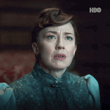 a woman says we 're both ambitious with a hbo logo behind her