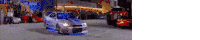 a car is driving down a street with a crowd of people behind it .