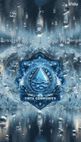 a logo for tirta community is shown on a screen