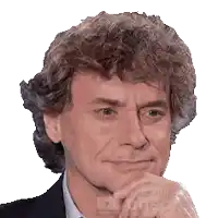 a close up of a man 's face with a youtube logo in the corner
