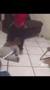 a tiktok video shows a child playing with a soccer ball